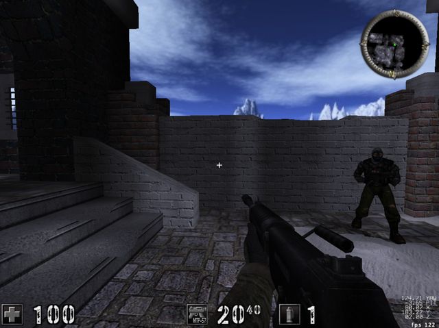 A first-person view of a brick courtyard with a crosshair at the centre and an opponent standing at the right.